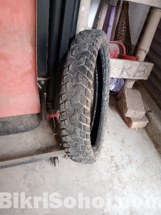 Ceat 100/90-18 grip tyre for sale